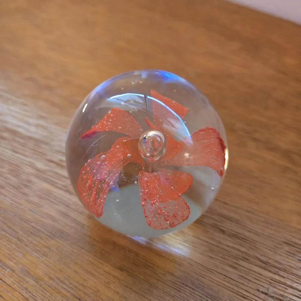 VINTAGE ART GLASS PAPERWEIGHT WITH ORANGE FLOWER INSIDE